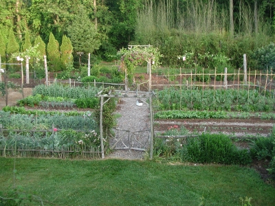 Vegetable garden, kept "weed-free" and fed by compost mulch