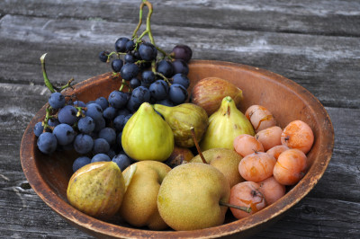 Fruit bowl with fig, grape, persimmon, nashi