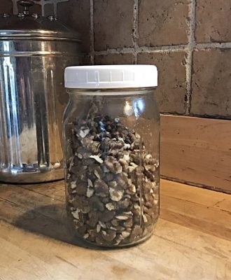 black walnuts in jar