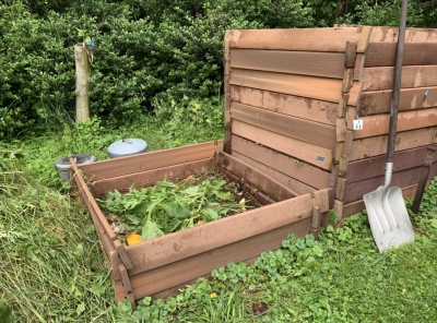 Compost bins, being filled & filled