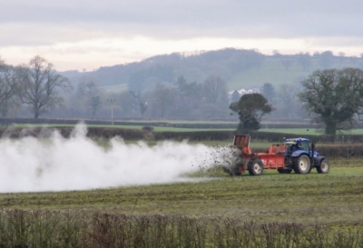 Spreading manure on a farm