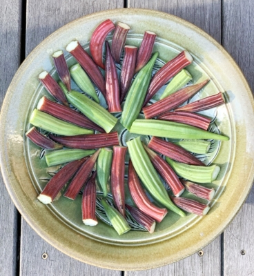 Okra, fruits displayed