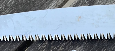 Close-up of tri-cut blade